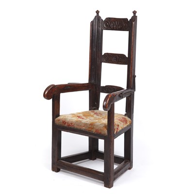 Lot 99 - A 17th century sleeping open armchair with a...