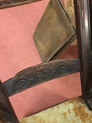 Lot 99 - A 17th century sleeping open armchair with a...