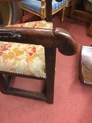 Lot 99 - A 17th century sleeping open armchair with a...
