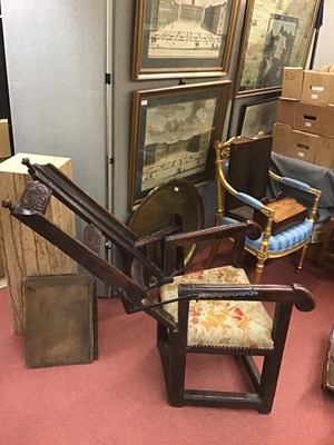Lot 99 - A 17th century sleeping open armchair with a...