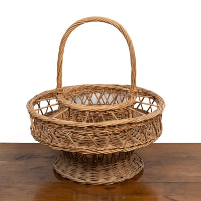 Lot 390 - A cylindrical wicker wine basket