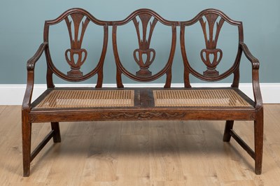 Lot 171 - A 19th century mahogany triple-shield-back sofa