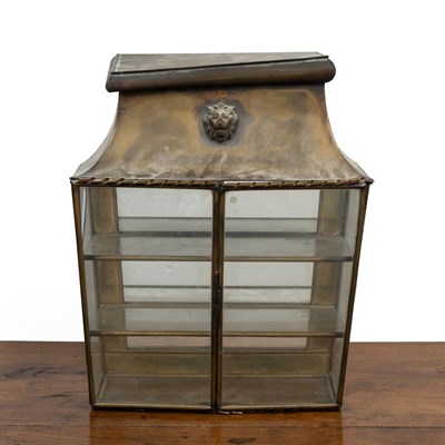 Lot 324 - A brass wall-mounted display cabinet