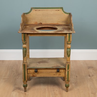 Lot 236 - A Regency cream-painted washstand