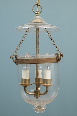 Lot 433 - A glass storm lantern