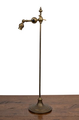 Lot 518 - A Faraday & Sons brass adjustable table lamp