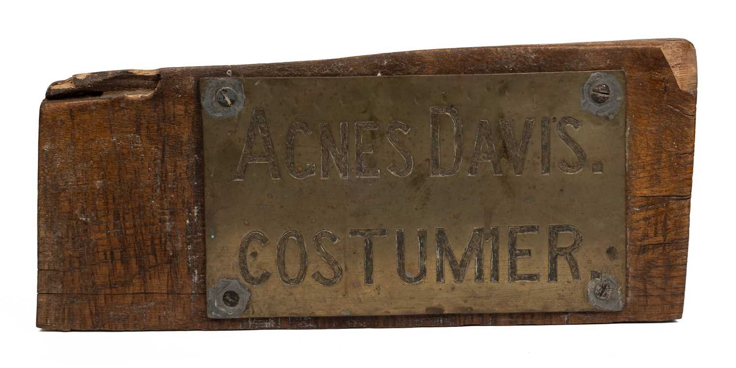 Lot 1069 - A brass name plaque for "Agnes Davis. Costumier."