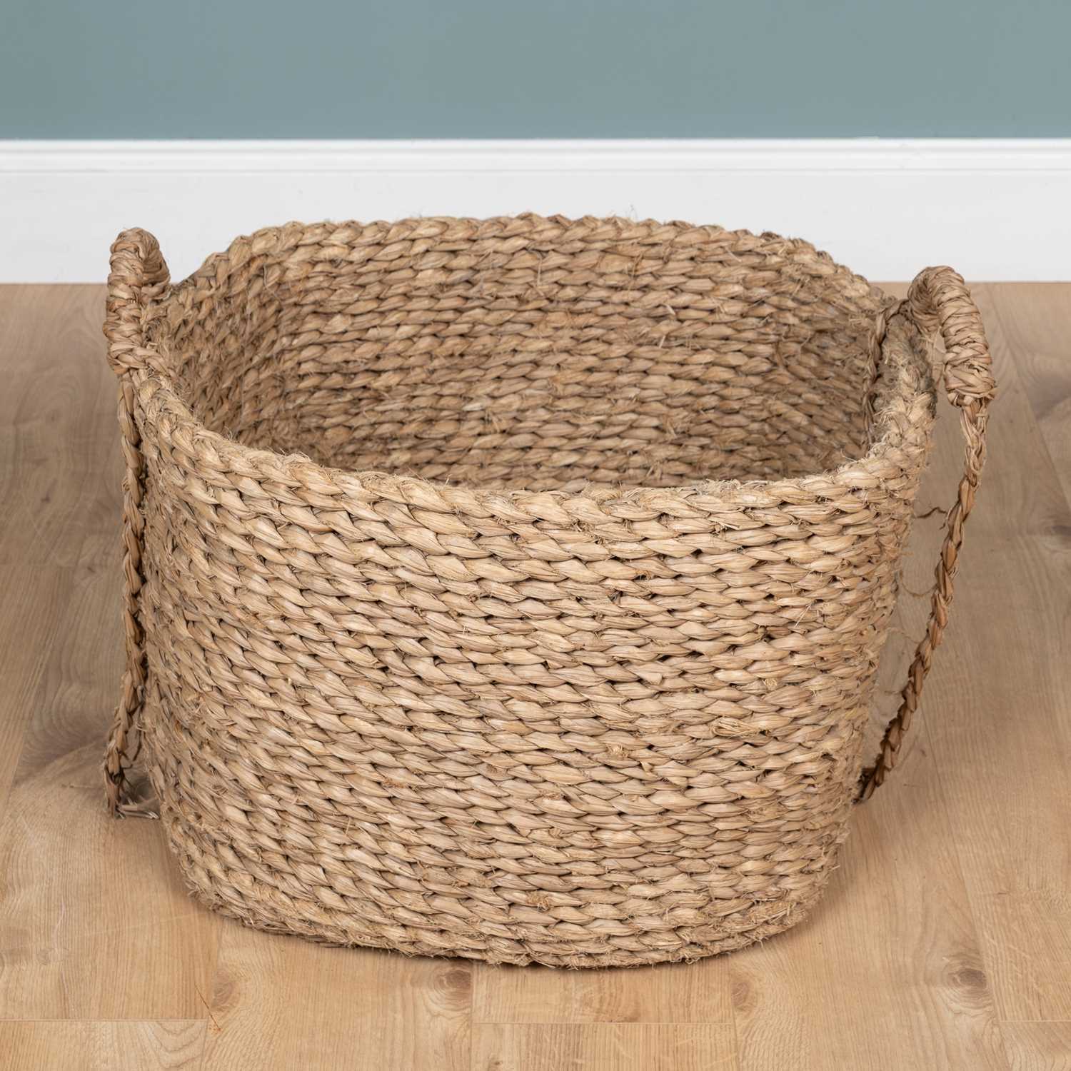 Lot 14 - A plaited-rush circular log basket