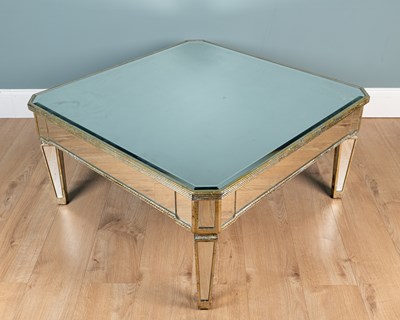 Lot 25 - A mirrored coffee table