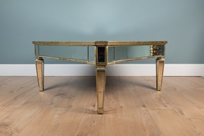 Lot 25 - A mirrored coffee table