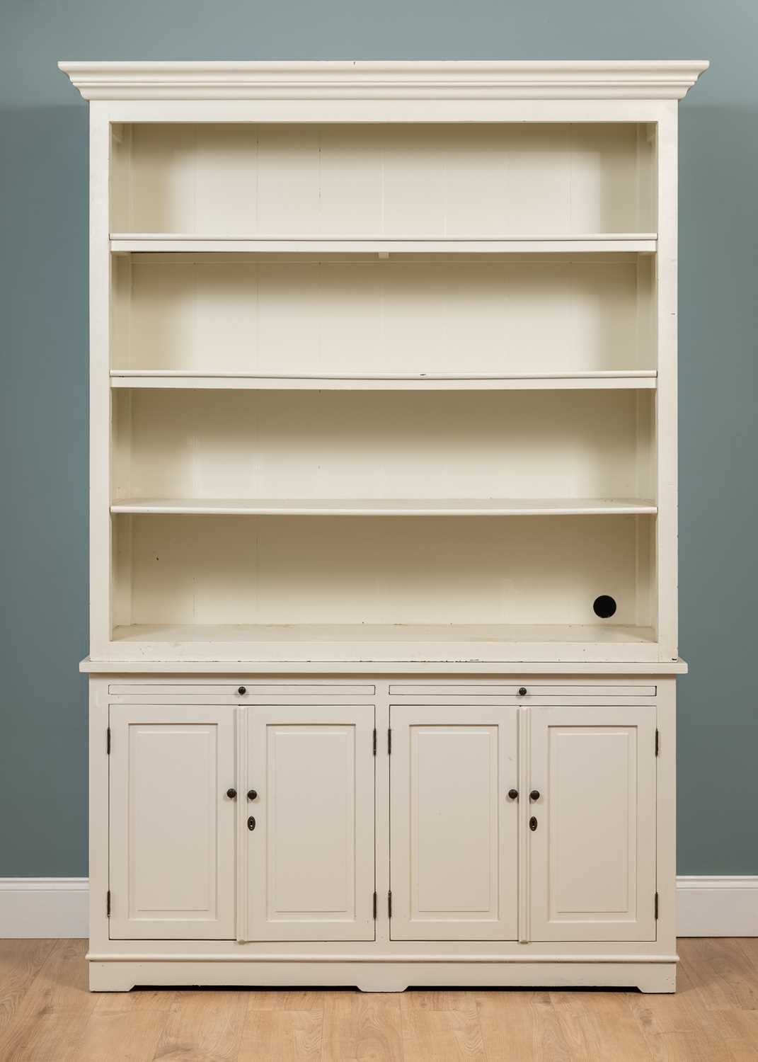 Lot 18 - A white-painted bookcase