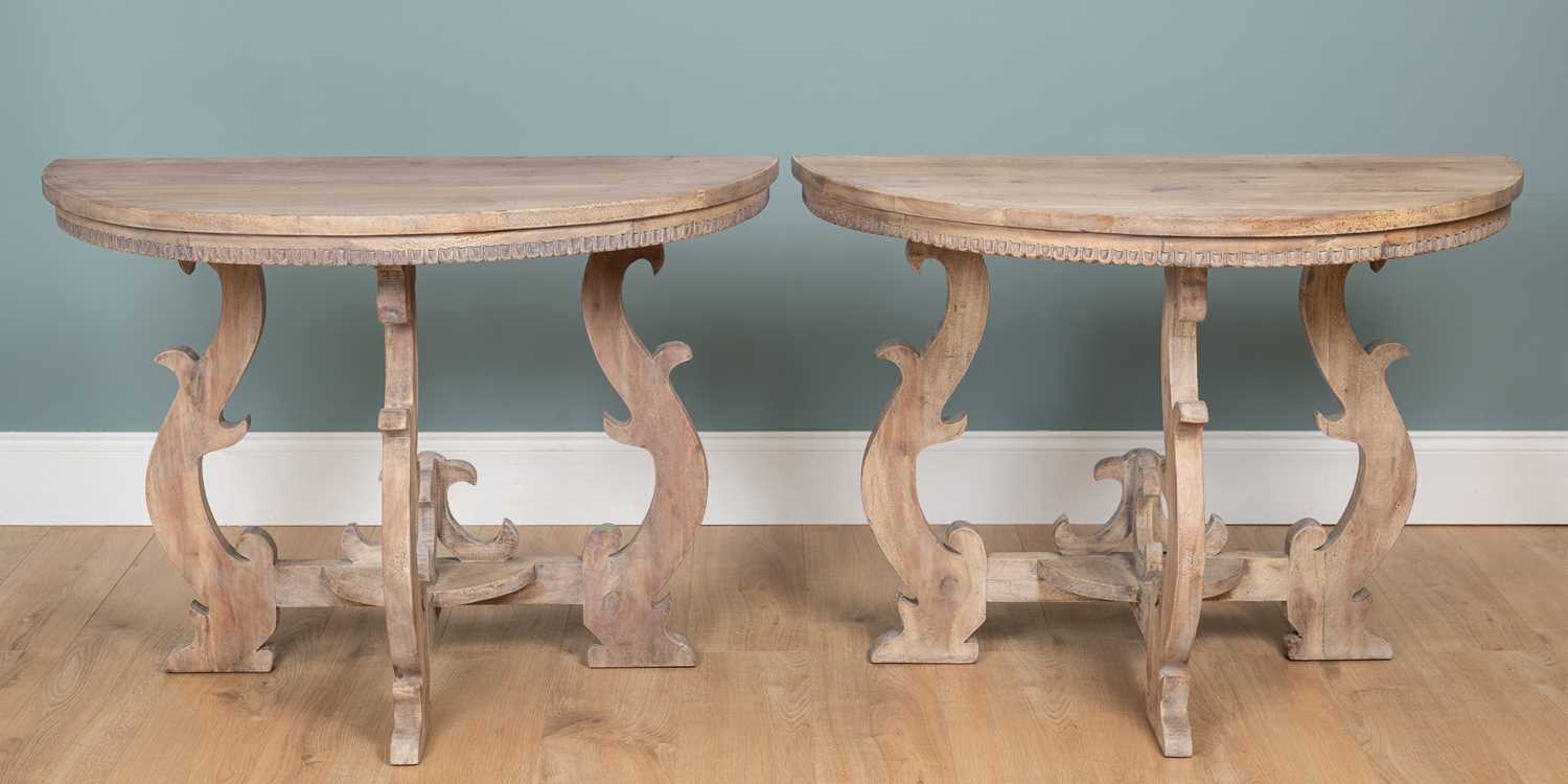 Lot 119 - A pair of OKA hardwood console tables