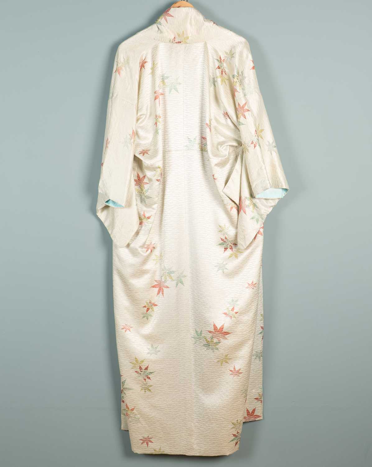 Lot 108 - A Japanese flower-decorated silk coat