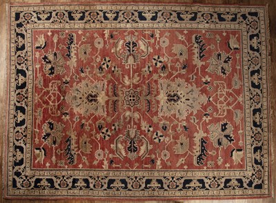 Lot 174 - Red ground large carpet Afghan of rust ground...