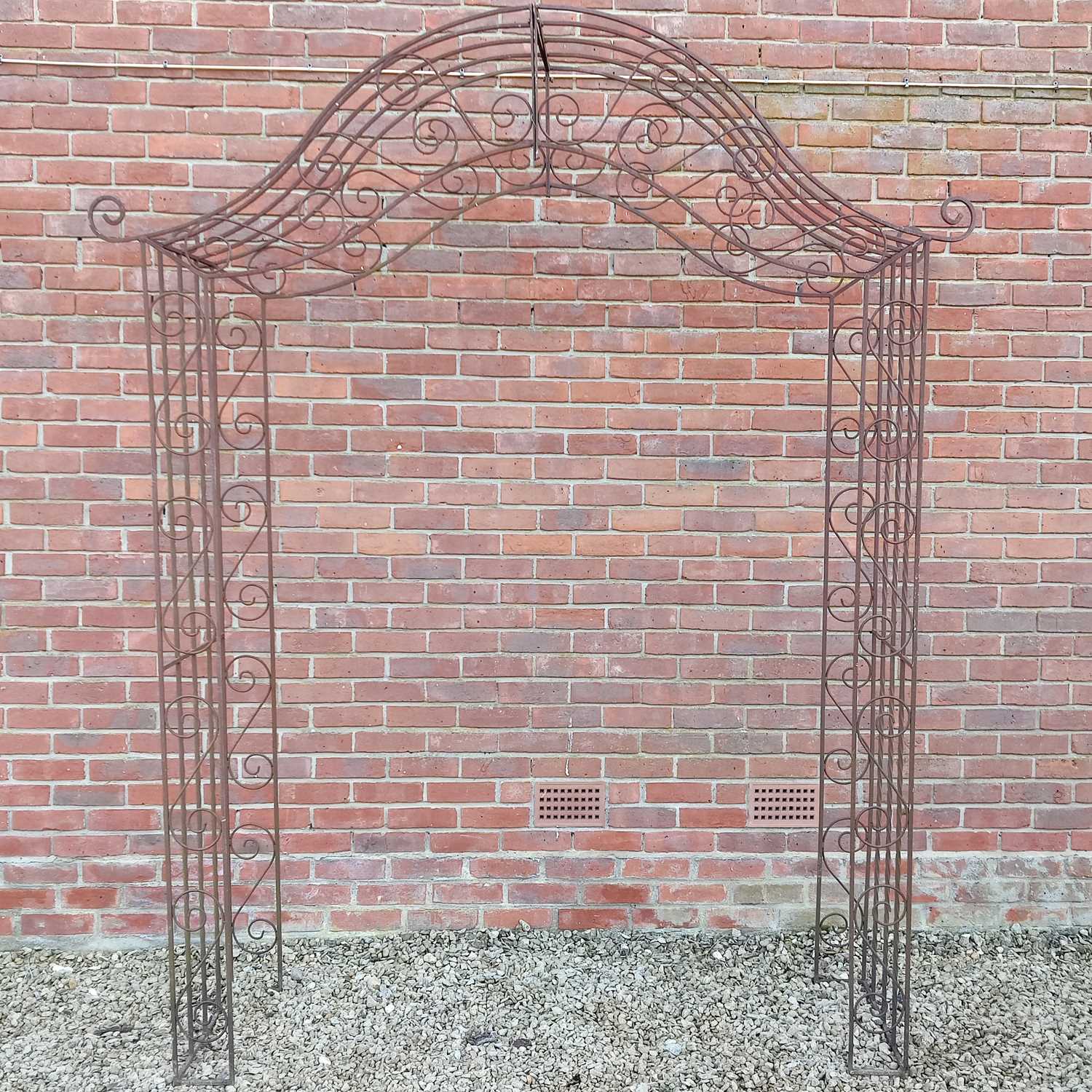 Lot 1504 - A wrought iron rose arch
