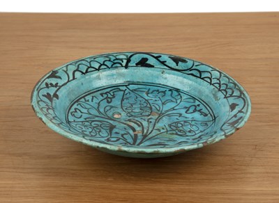 Lot 154 - Kashan turquoise-glazed pottery dish Iran,...