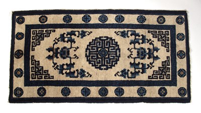 Lot 276 - Peking rug Chinese of ivory and blue ground...