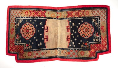 Lot 278 - Antique saddle cover Tibetan with stylised...