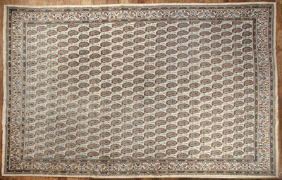 Lot 282 - Qom carpet Iran of ivory ground with paisley...