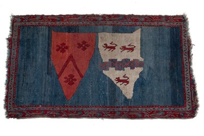 Lot 188 - An early 20th century woollen hand-knotted Turkish rug