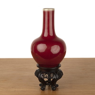 Lot 93 - Sang de boeuf bottle vase and stand Chinese,...