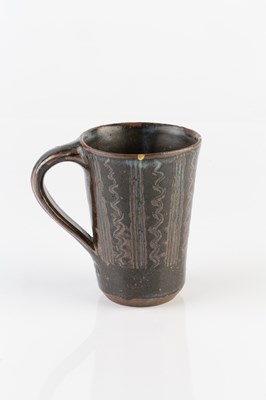 Lot 690 - Ladi Kwali (1925-1984) Large flaring mug with...