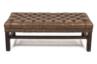 Lot 322 - A modern leather upholstered stool