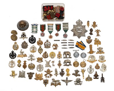 Lot 221 - A collection of medals and cap badges