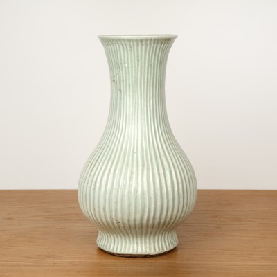 Lot 134 - Pale green glazed vase Chinese, 19th Century...