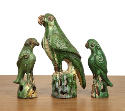 Lot 144 - Three green-glazed model parrots Chinese, 19th...