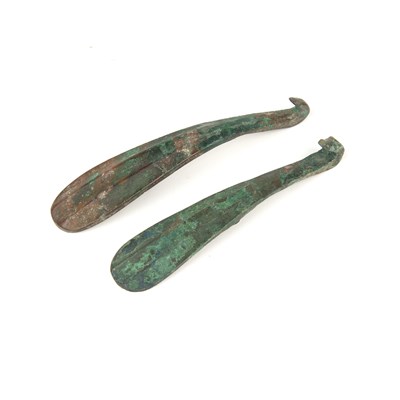 Lot 439 - Two similar bronze belt hooks Chinese, Han...