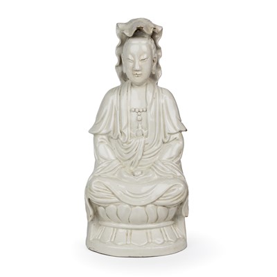 Lot 246 - A Blanc de chine figure of Guanyin 15cm wide...