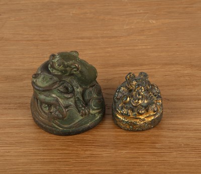 Lot 478 - Two bronze scroll weights Chinese, Han dynasty...