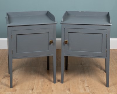 Lot 311 - A pair of grey-painted pot cupboards