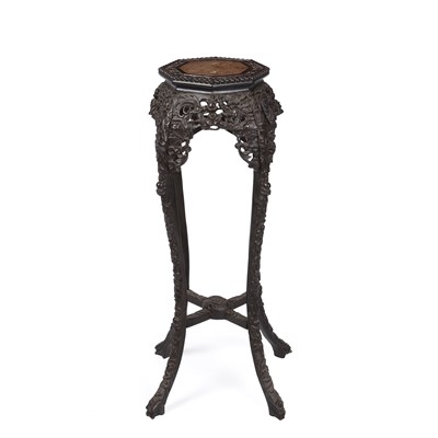 Lot 149 - A late 18th century Chinese carved hardwood...