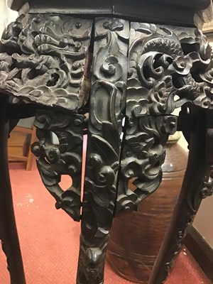Lot 149 - A late 18th century Chinese carved hardwood...