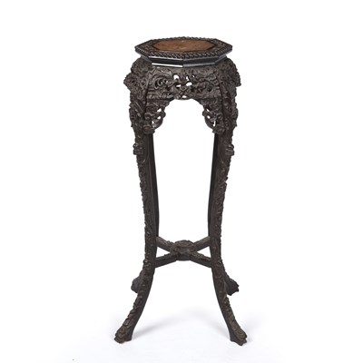 Lot 149 - A late 18th century Chinese carved hardwood...