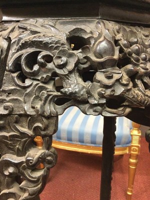 Lot 149 - A late 18th century Chinese carved hardwood...