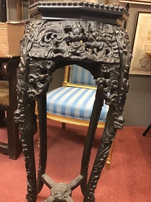 Lot 149 - A late 18th century Chinese carved hardwood...