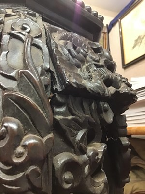 Lot 149 - A late 18th century Chinese carved hardwood...