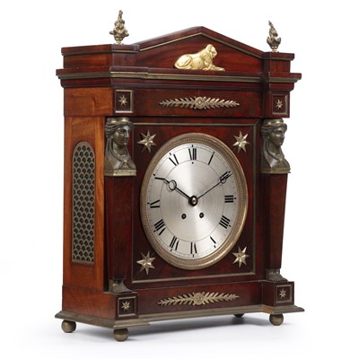 Lot 128 - A 19th century French empire mahogany commode...