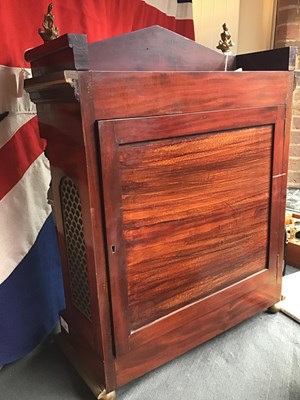 Lot 128 - A 19th century French empire mahogany commode...