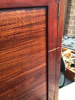 Lot 128 - A 19th century French empire mahogany commode...