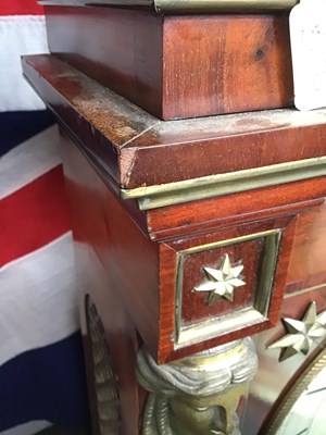 Lot 128 - A 19th century French empire mahogany commode...