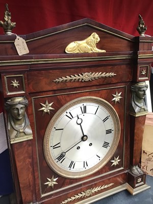 Lot 128 - A 19th century French empire mahogany commode...