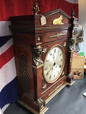 Lot 128 - A 19th century French empire mahogany commode...