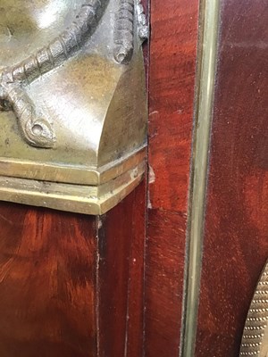 Lot 128 - A 19th century French empire mahogany commode...