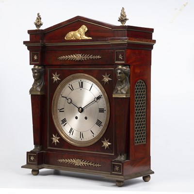Lot 128 - A 19th century French empire mahogany commode...