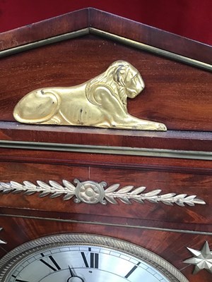 Lot 128 - A 19th century French empire mahogany commode...