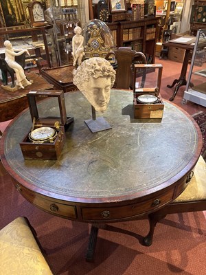 Lot 139 - A Regency style mahogany drum table with green...
